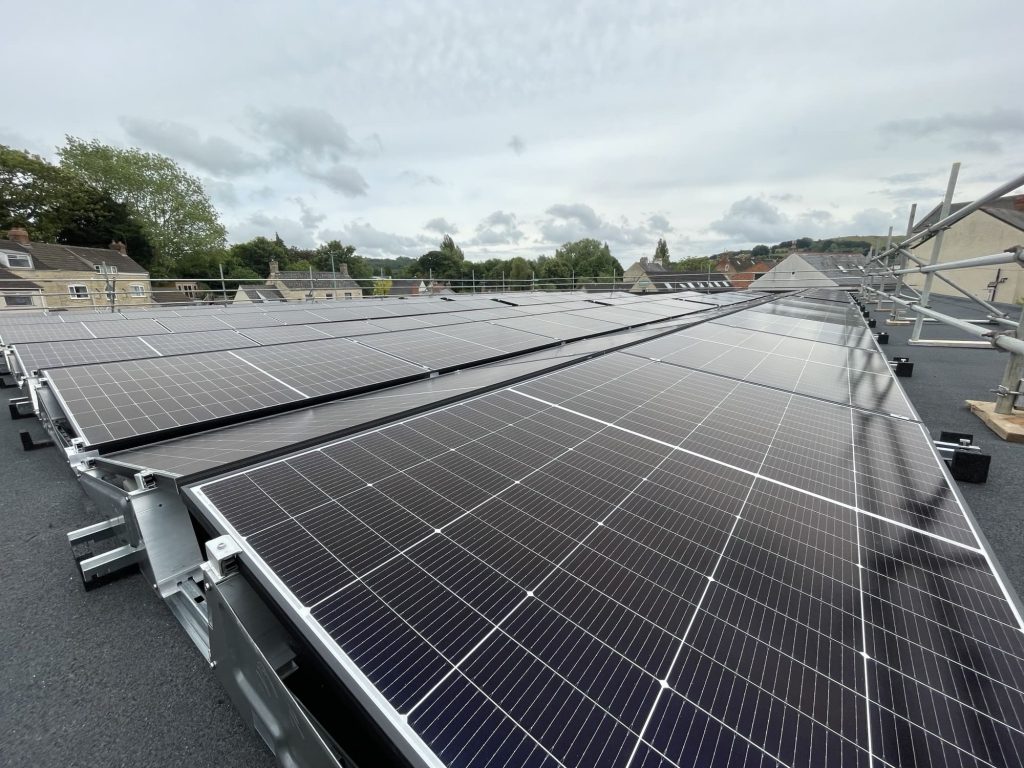 Close up flat roof solar system stroud fire station